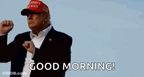 Donald Trump Is Wearing A Red Hat And A Suit And Is Giving A Good Morning . GIF