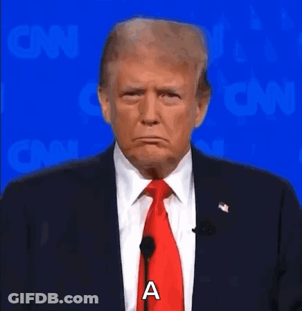 Donald Trump Is Wearing A Suit And Tie And Making A Sad Face While Standing In Front Of A Microphone . GIF