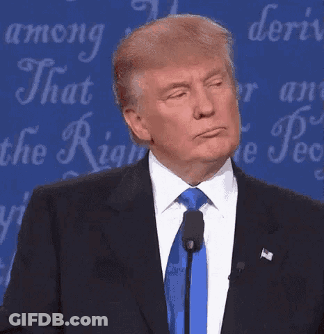 Donald Trump Making Funny Face Into Microphone GIF