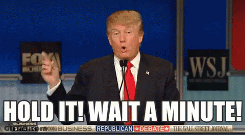 Donald Trump Says Hold It Wait A Minute In Front Of A Fox Business Republican Debate Sign GIF