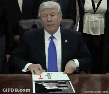 Donald Trump Sitting At Table With Mayor Sign GIF