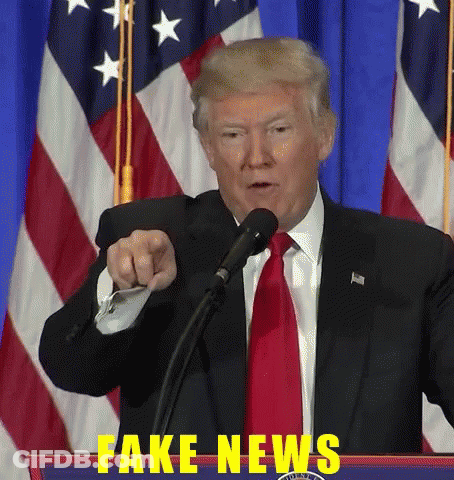 Donald Trump Speaking Into A Microphone With Fake News Written In Yellow Letters GIF
