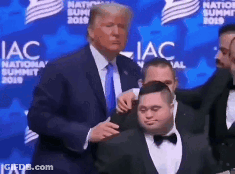 Donald Trump Standing Next To Man With Down Syndrome GIF
