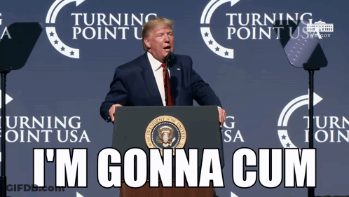 Donald Trump Stands At A Podium With A Sign That Says Turning Point Usa Behind Him GIF