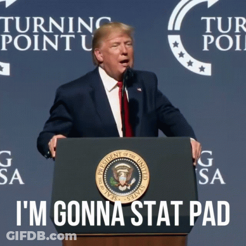 Donald Trump Stands At A Podium With The Words I 'M Gonna Stat Pad Written Below Him GIF