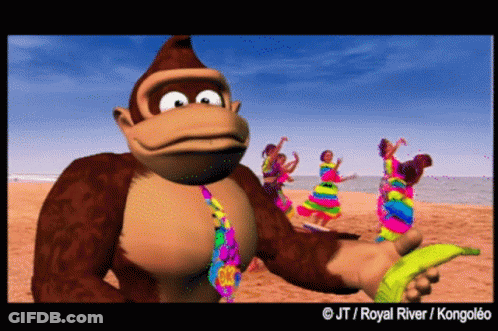 Donkey Kong Standing On Beach Holding Banana And Dancing GIF