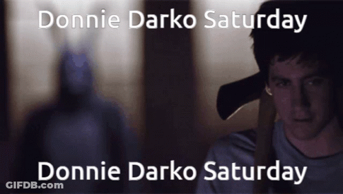 Donnie Darko Saturday And Donnie Darko Saturday Are Written On A Dark Background GIF