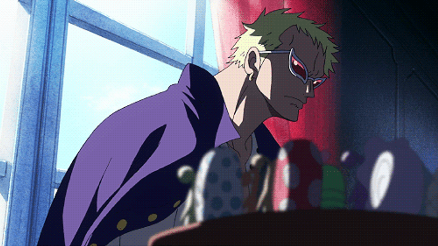 Donquixote Doflamingo From One Piece With A Serious Look GIF