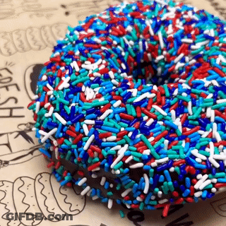Donut With Blue Red And White Sprinkles GIF