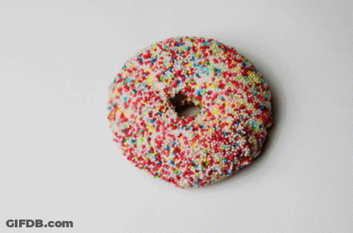 Donut With White Frosting And Sprinkles GIF