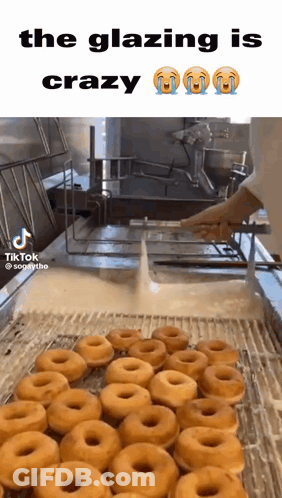 Donuts Being Glazed In Fryer GIF