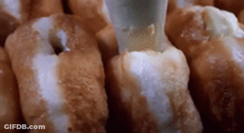 Donuts With Icing Being Poured GIF