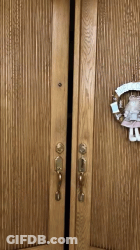 Door With Wreath Saying Welcome GIF