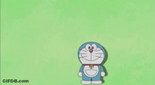 Doraemon Holding Sign Saying I Am Banned GIF