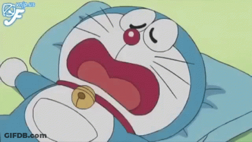 Doraemon Lying On Pillow With Bell GIF