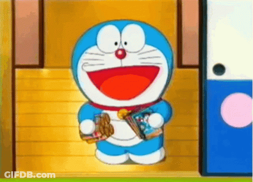 Doraemon Smiling Holding Book GIF