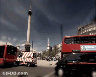 Double Decker Bus With Ambulance Sign GIF