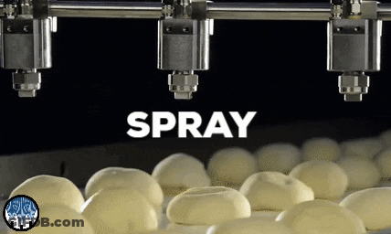 Dough Balls Being Sprayed GIF