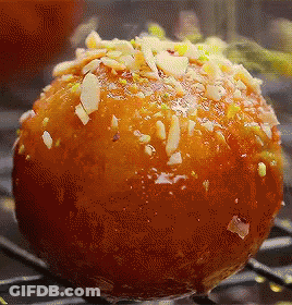 Doughnut Close Up With Nuts GIF