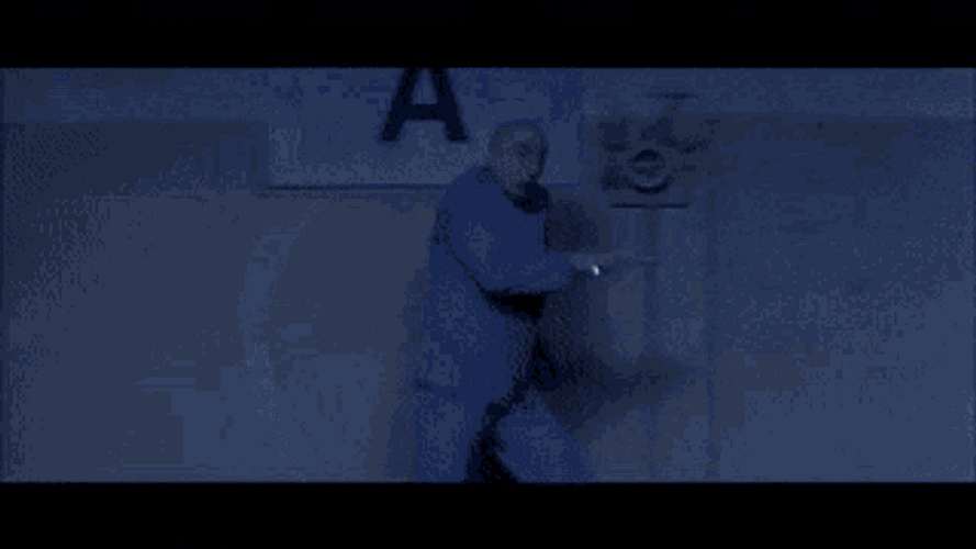 Dr. Evil Caught In Spotlight GIF