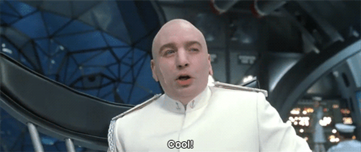 Dr. Evil Shrugs Shoulder Saying Cool GIF