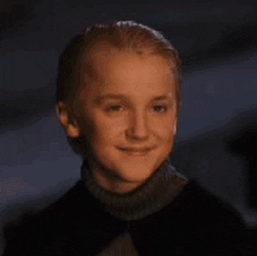 Draco Malfoy Mischievous Smile GIF