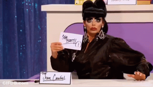 Drag Queen Holding Star Berry Paper GIF