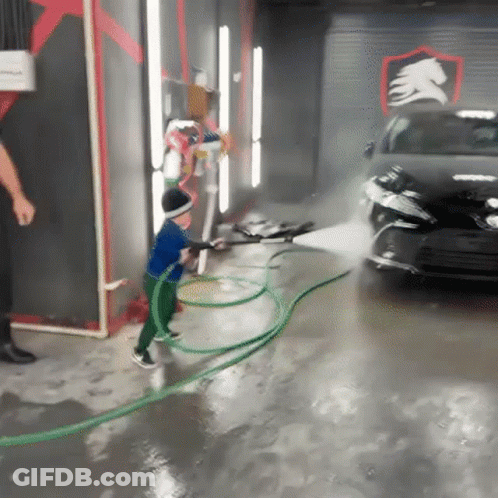 Drag Queen In Crown High-Fiving While Dancing On Stage GIF