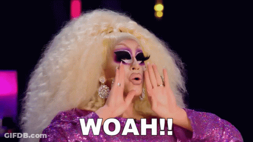 Drag Queen In Purple Dress Saying Woah GIF