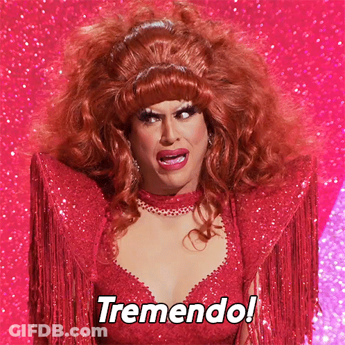 Drag Queen In Red Dress Saying Tremendo GIF