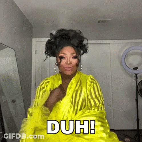 Drag Queen In Yellow Dress Says Duh GIF