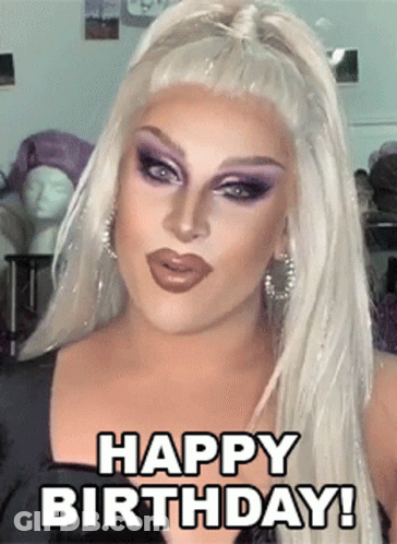 Drag Queen Saying Happy Birthday In Front Of Mannequin GIF