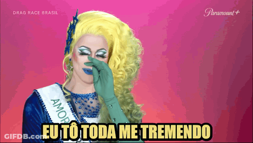 Drag Queen Wearing Sash Saying Amor GIF