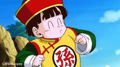 Dragon Ball Z Character In Yellow Shirt With Chinese Characters GIF