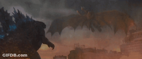 Dragon Flying Over City Fighting Monster GIF