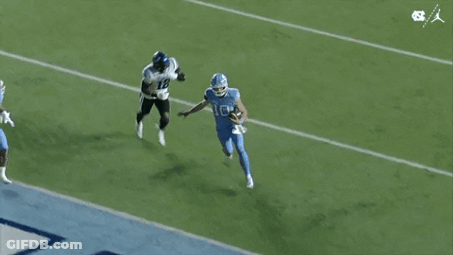 Drake Maye Throwing Football High Up GIF