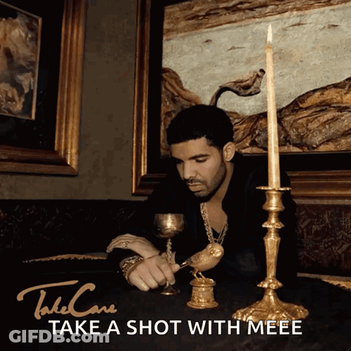 Drake Take Care Album Cover Man At Table With Candles And Bird GIF