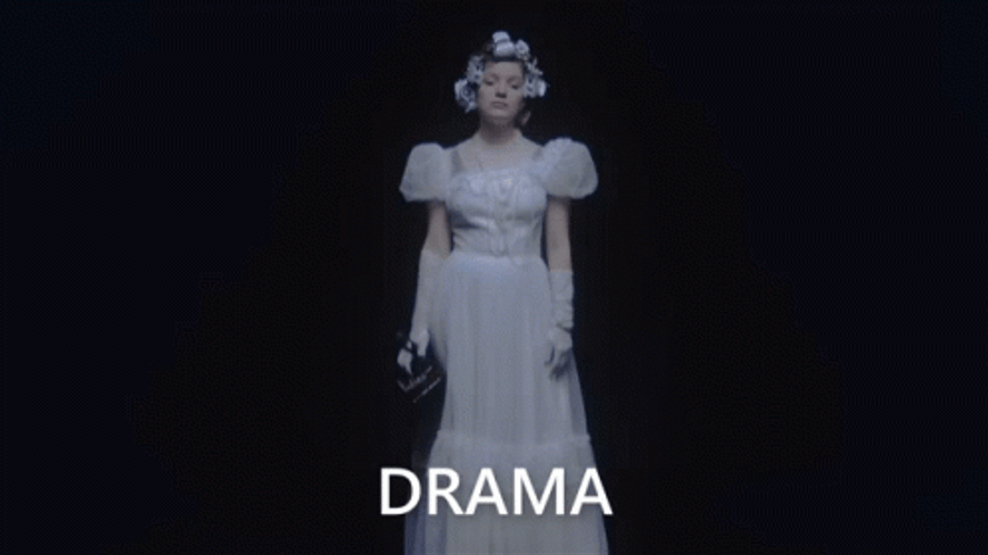 Dramatic Lady Holding Video Camera GIF
