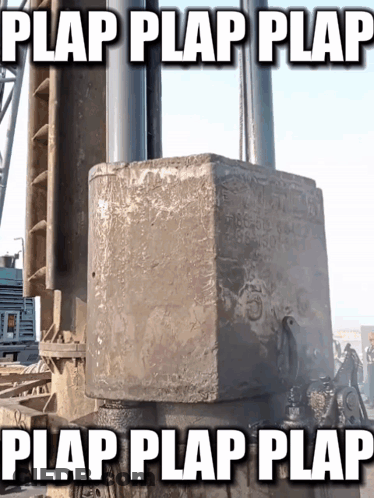 Dreadlocked Man In Red Hat Looking At Camera GIF