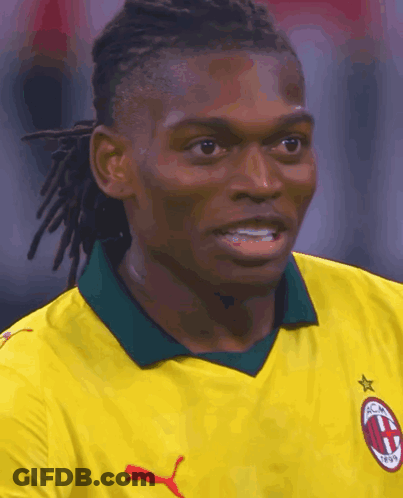 Dreadlocked Man In Yellow Puma Shirt GIF