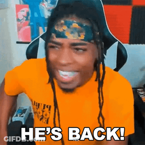 Dreadlocked Man In Yellow Shirt Says He's Back GIF
