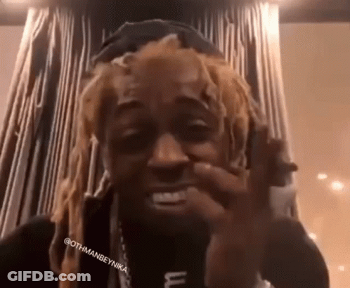 Dreadlocked Man Making Funny Face Wearing Hat GIF