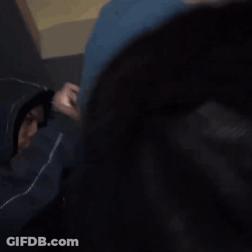 Dreadlocked Man Smoking, Another Drinking From Cup GIF