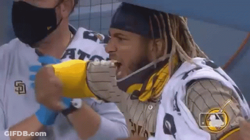 Dreadlocks Man Eating Hot Dog In Mask And Gloves GIF