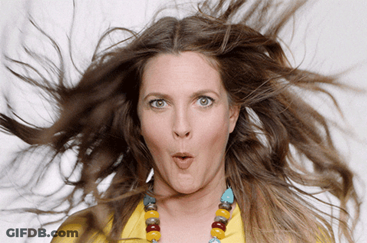 Drew Barrymore Blowing GIF