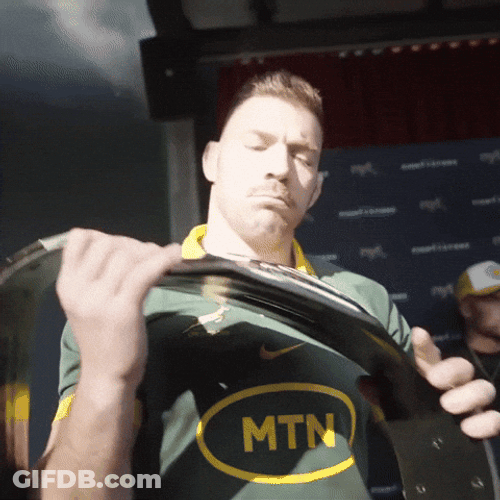 Dricus Du Plessis Showing His Belt GIF