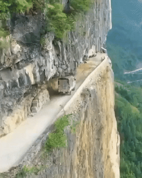 Driving Through Mountain Road Cliff GIF