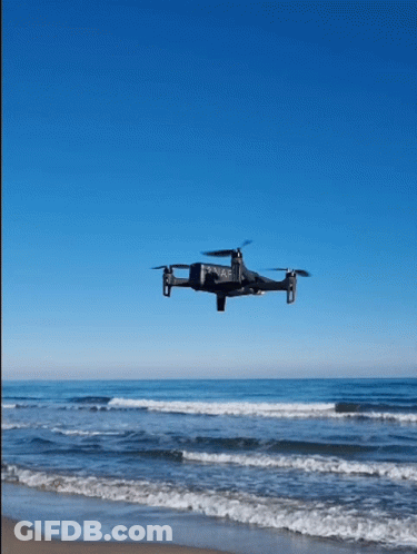 Drone Flying Over Beach With Snap GIF