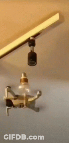 Drone Flying Over Light Bulb GIF