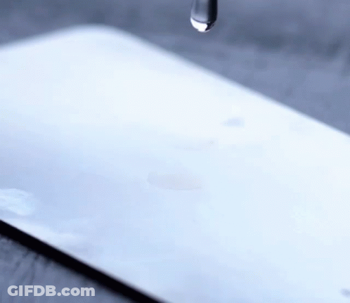 Drop Of Water Falling On Tablet GIF